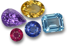 一些最受欢迎的有色宝石：蓝色蓝宝石、红宝石、托帕石、黄水晶和紫水晶