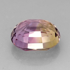 21.12克拉天然双色紫黄晶，椭圆形切割，19×16毫米，VVS