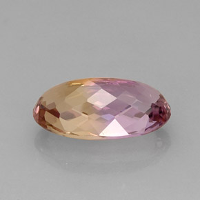 12.86克拉天然双色紫黄晶，椭圆形切割，20.9×11.5毫米，IF