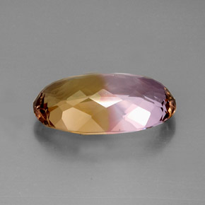 20.51克拉天然双色紫黄晶，椭圆形切割，24.6×14.4毫米，IF