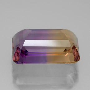 6.91克拉天然双色紫黄晶，祖母绿式切割，13.9×9.4毫米，VVS