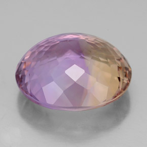 9.52克拉天然双色紫黄晶，椭圆形切割，14.9×13.4毫米，IF