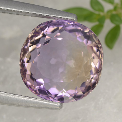 5.22克拉天然双色紫黄晶，椭圆形切割，10.2×10.1毫米，VVS