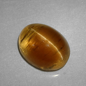 3.32克拉天然黄色Cat's Eye Apatite，椭圆形切割，9.3×7.2毫米，半透明