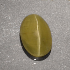 1.40克拉天然黄色Cat's Eye Apatite，椭圆形切割，7.7×5.3毫米，半透明