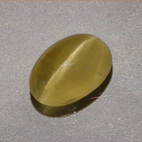 1.40克拉天然黄色Cat's Eye Apatite，椭圆形切割，7.7×5.3毫米，半透明