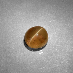 1.61克拉天然黄色Cat's Eye Apatite，椭圆形切割，6.2×5.7毫米，半透明