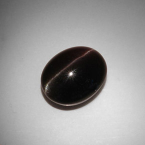 11.50克拉天然棕色Cat's Eye Scapolite，椭圆形切割，15×12.1毫米，半透明