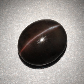 6.82克拉天然棕色Cat's Eye Scapolite，椭圆形切割，13×11.2毫米，半透明