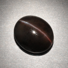 6.82克拉天然棕色Cat's Eye Scapolite，椭圆形切割，13×11.2毫米，半透明