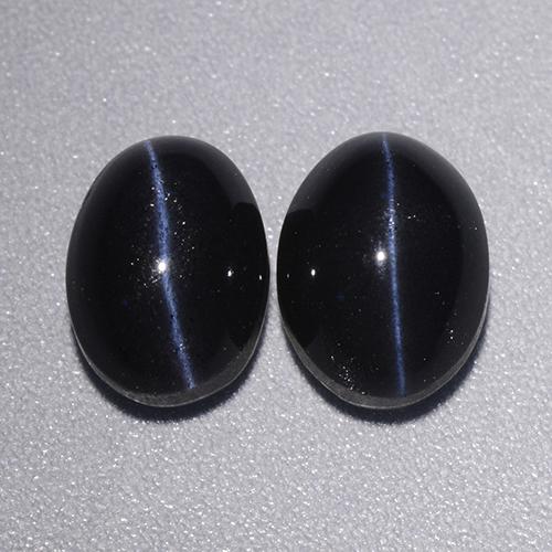 4.46天然黑色Cat's Eye Scapolite，椭圆形切割，8.1×6毫米，不透明