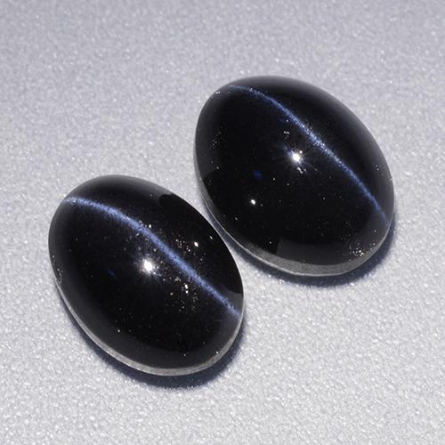 4.46天然黑色Cat's Eye Scapolite，椭圆形切割，8.1×6毫米，不透明