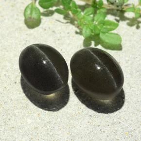 7.38天然灰色Cat's Eye Scapolite，椭圆形切割，9.9×7.5毫米，半透明