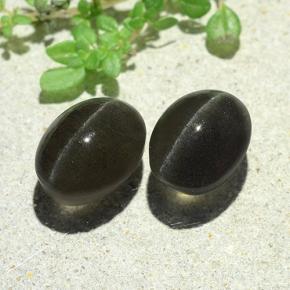 7.38天然灰色Cat's Eye Scapolite，椭圆形切割，9.9×7.5毫米，半透明