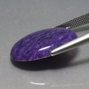 11.88克拉天然紫龙晶，椭圆形切割，不透明