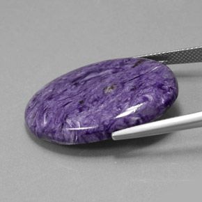 27.59克拉天然紫龙晶，椭圆形切割，不透明