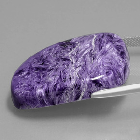 63.04克拉天然紫龙晶，异形，不透明