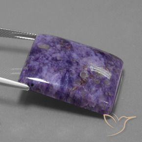 54.21克拉天然紫龙晶，狭长方形，不透明