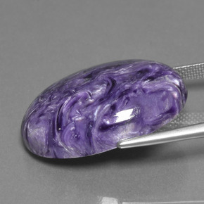 24.07克拉天然紫龙晶，椭圆形切割，不透明