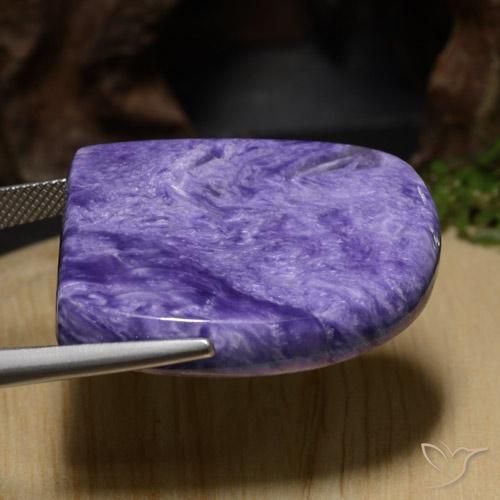 46.73克拉天然紫龙晶，花式切割，不透明