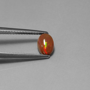 0.63克拉天然多色巧克力欧泊，透明，7×5.1毫米，透明/半透明