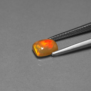 0.67克拉天然多色巧克力欧泊，透明，7.1×5.2毫米，透明/半透明