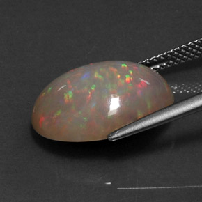 5.59克拉天然多色巧克力欧泊，椭圆形切割，16.5×12.6毫米，不透明