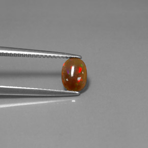 0.43克拉天然多色巧克力欧泊，椭圆形切割，7.5×5.4毫米，不透明