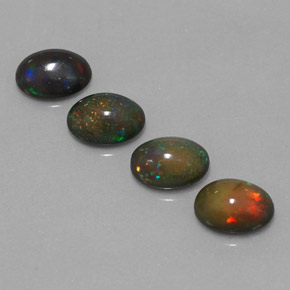 3.00天然多色巧克力欧泊，椭圆形切割，7.9×6.1毫米，半透明