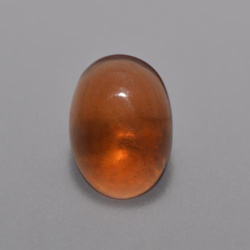 0.36克拉天然橙色巧克力欧泊，椭圆形切割，6.9×5毫米，透明