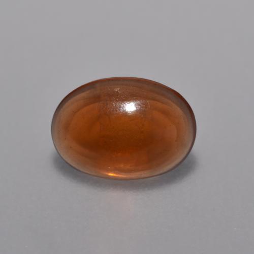 0.36克拉天然橙色巧克力欧泊，椭圆形切割，6.9×5毫米，透明