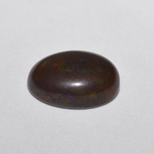 0.52克拉天然多色巧克力欧泊，椭圆形切割，8×5.8毫米，半透明