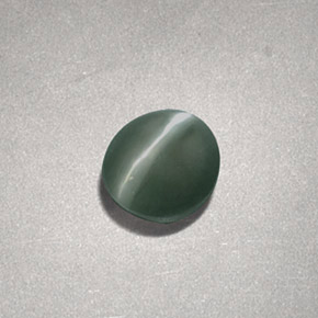 0.73克拉天然绿色Chrysoberyl Cat's Eye，椭圆形切割，5.1×4.7毫米，不透明