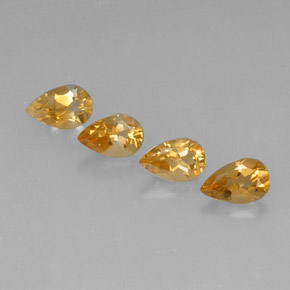 天然黄金色黄水晶，梨形，7.8×5毫米，VVS