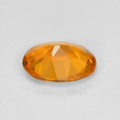 0.68克拉天然橙色单斜硅镁石，椭圆形切割，6.6×5.2毫米，SI