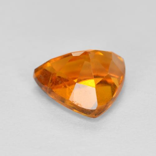 0.87克拉天然橙色单斜硅镁石，三角形，6.5×5.7毫米，SI