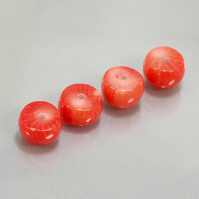天然粉色珊瑚，异形，8.3×4.9毫米，不透明