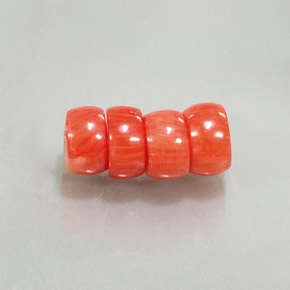 天然粉色珊瑚，异形，8.3×4.9毫米，不透明