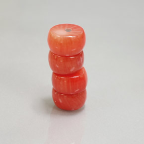 天然粉色珊瑚，异形，8.3×4.9毫米，不透明