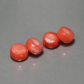 天然粉色珊瑚，异形，8.4×4.3毫米，不透明