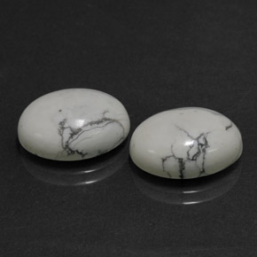 天然白色豪石，椭圆形切割，14.2×10.2毫米，不透明