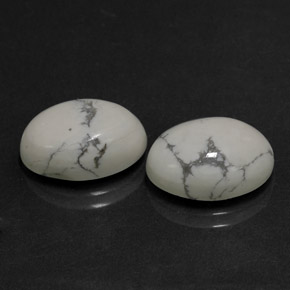 天然白色豪石，椭圆形切割，14.2×10.4毫米，不透明