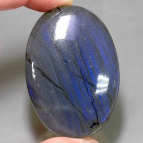 145.20克拉天然多色拉长石，椭圆形切割，51.1×35.8毫米，不透明