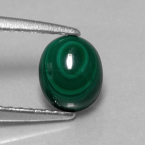 1.51克拉天然绿色孔雀石，椭圆形切割，6.4×5.3毫米，不透明