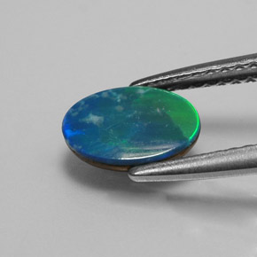 0.73克拉天然蛋白石双峰，椭圆形切割，不透明