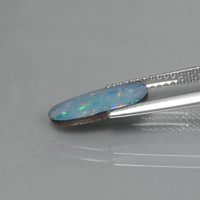 0.98克拉天然多色欧泊拼合石，异形，12.8×5.4毫米，不透明
