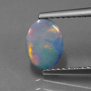 0.69克拉天然蛋白石双峰，椭圆形，不透明