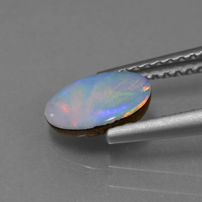 0.69克拉天然蛋白石双峰，椭圆形，不透明