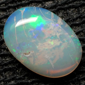 0.36克拉天然多色欧泊，椭圆形切割，7×4.9毫米，不透明