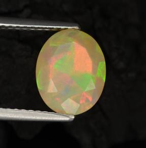 1.57克拉天然多色欧泊，椭圆形切割，10.1×8.2毫米，半透明